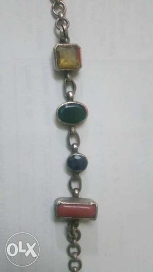 Green, Red, And Yellow Gemstone