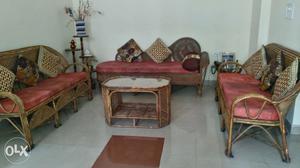 Nine seater cane sofa set with center table in
