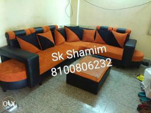 Orange And Black Leather Sectional Couch With Ottomna