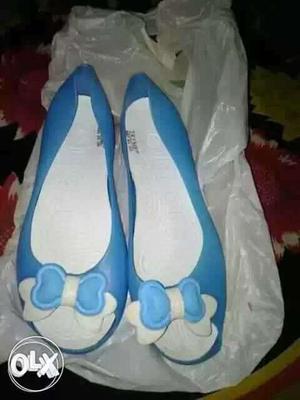 Pair Of Blue-and-white Flats
