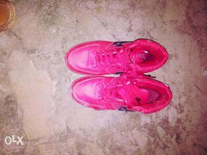 Pair Of Pink High-top Sneakers