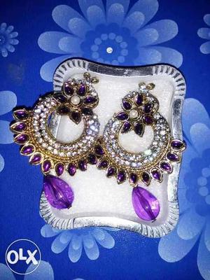 Pair Of Purple Gemstone And Gold-colored Earrings