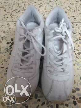 Pair Of White Athletic Shoes