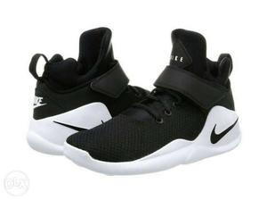 Pair Of White-and-black Nike Basketball Shoes