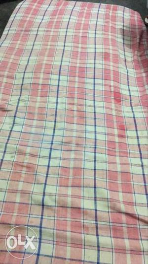 Pink, White, And Blue Plaid-print Textile