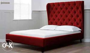 Red Bed With White Mattress And Pillows