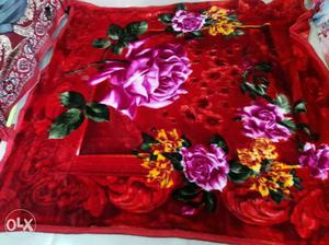 Red, Pink, And Yellow Floral Textile