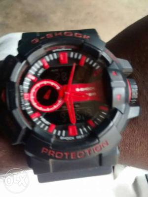 Round Black And Red Casio G-Shock Digital Watch