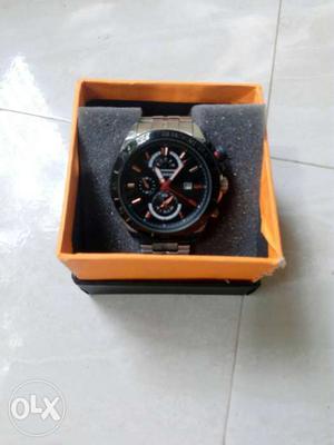 Round Black And Silver Chronograph Watch In Box