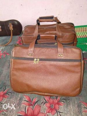 Two Brown Leather Handbags