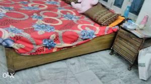Want to sell my wooden bed good condition urgent need to