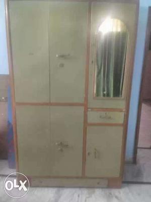 White And Brown Wooden Armoire With Mirror
