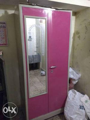 White And Pink Metal Cabinet