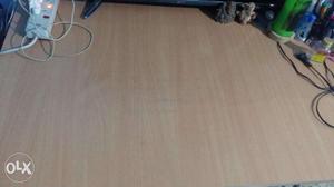 Wooden table with metal stand for sale