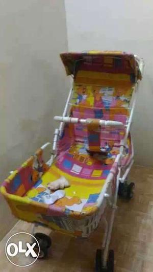 Yellow And Pink Stroller... pr negotiation.