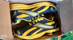 Yellow-and-black Shox Shoes In Box 7 no.