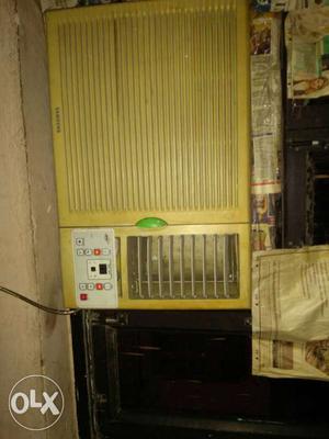 Beige Window Type Air Conditioner