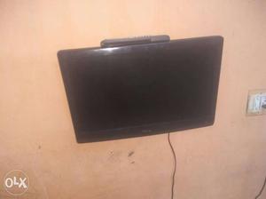 Black Flat Screen Television With Remote Controller fix