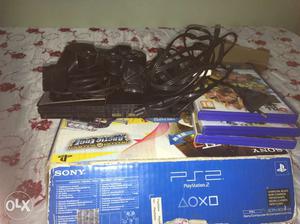 Black Sony PS2 Console With Controller And Game Cases