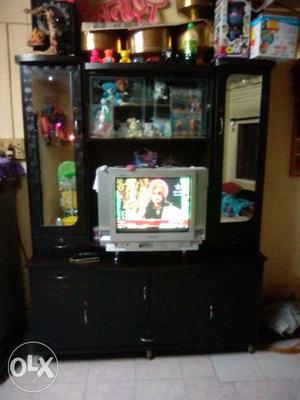 Black Wooden TV Hutch With Flat Screen Television