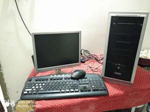 Gray Flat Screen Computer Monitor With Keyboard And Mouse