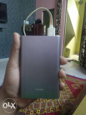 Gray Power Bank With Cord
