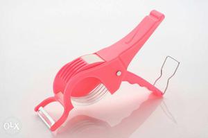 Pink And White Plastic Tool
