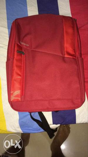 Red color targus laptop bag