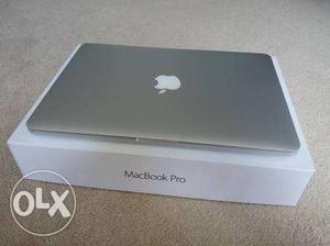 Silver MacBook Pro On Box