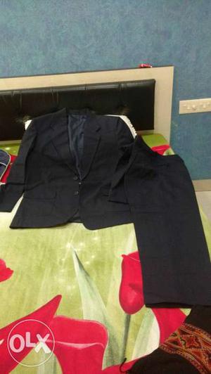 Size 34 colour navy blue used one time only