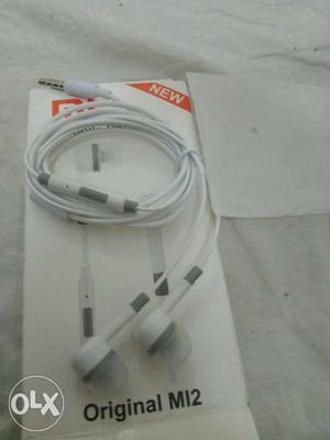 White And Gray Earbuds With Box