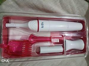 White And Red Veet Cordless Device