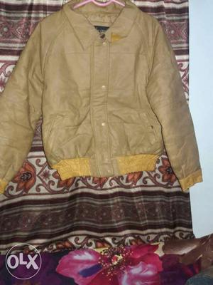 10to15yrs old in yellow leather jacket