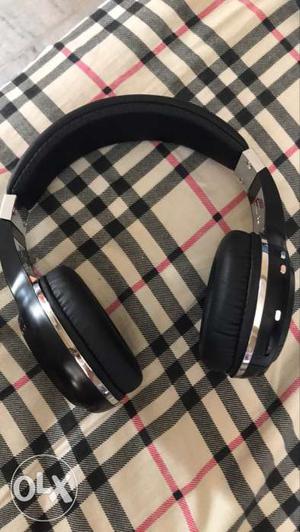 Black And Gray Cordless Over-ear Headset