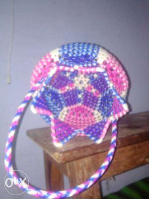 Blue, Pink, And White Knitted Basket