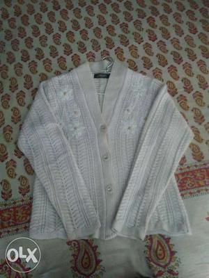 Ladies sweater in white colour unused. Moti and