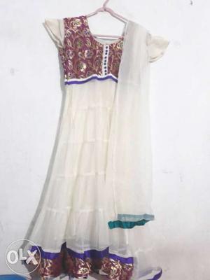 Off white net anarkali with pant And net odni