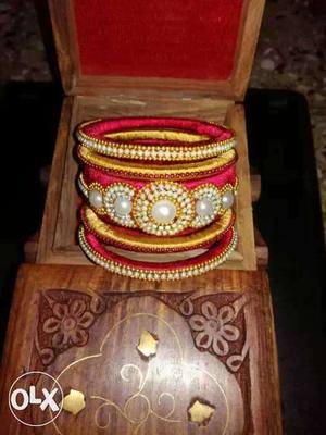 Red And Gold-colored Silk Thread Bangles