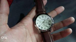 Round Silver Fossil Chronograph Watch With Brown Leather