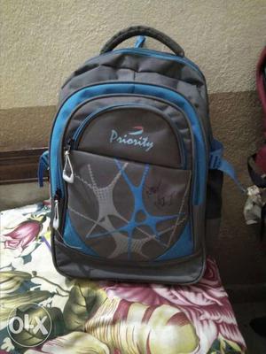 Black And Blue Priority Backpack