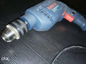 Blue And Red Bosch Corded Hand Drill