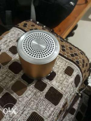 Cylindrical Gray And Brown Portable Speaker