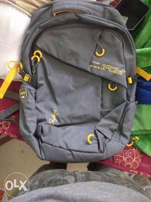 Gray And Yellow Backpack