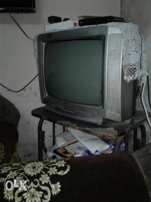 Gray CRT Television With Remote