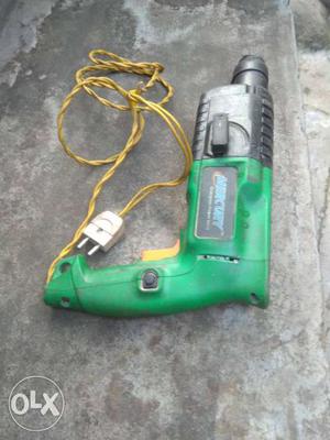 Green And Gray Corded Power Drill