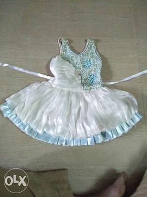 New floral frock in white n sky blue color Perl's