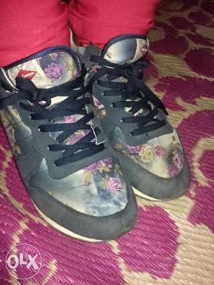 Pair Of Gray-and-purple Floral Print Shoes