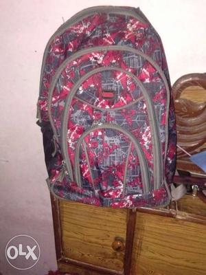 Red,gray, And White Printed Backpack