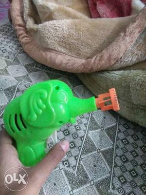 Toddler's Green And Orange Plastic Elephant Shaped Toy