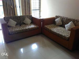 2 cane sofas (2x2) and 2 small cane stools